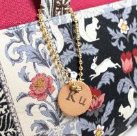 【Atelier Ku】さん / ハンドルつきワイヤーポーチ(ブラック×レッド)