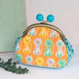 【Angela】さん / あめ玉がま口ポーチ(ネコ・オレンジ)