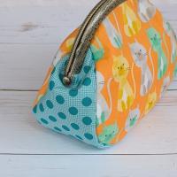 【Angela】さん / あめ玉がま口ポーチ(ネコ・オレンジ)